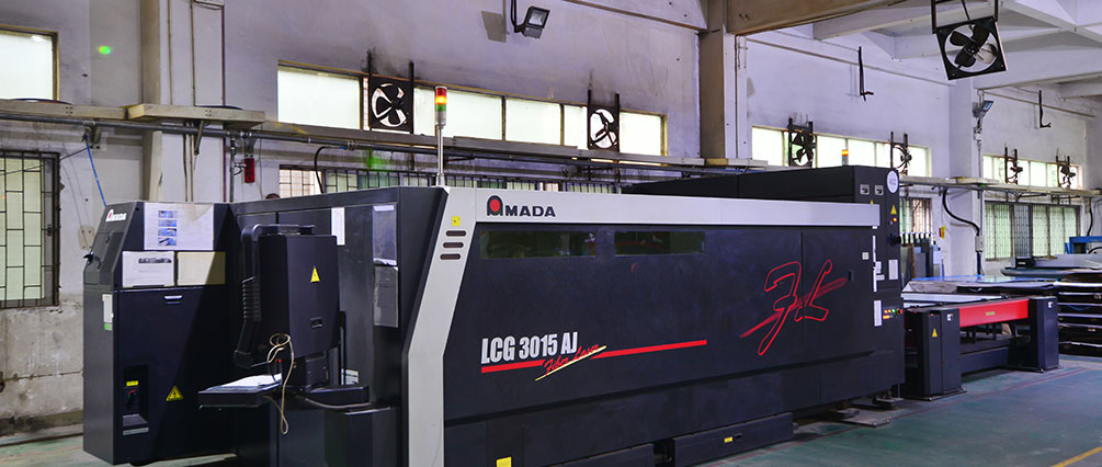 Large CNC punch/laser or sheet-metal processing equipment.