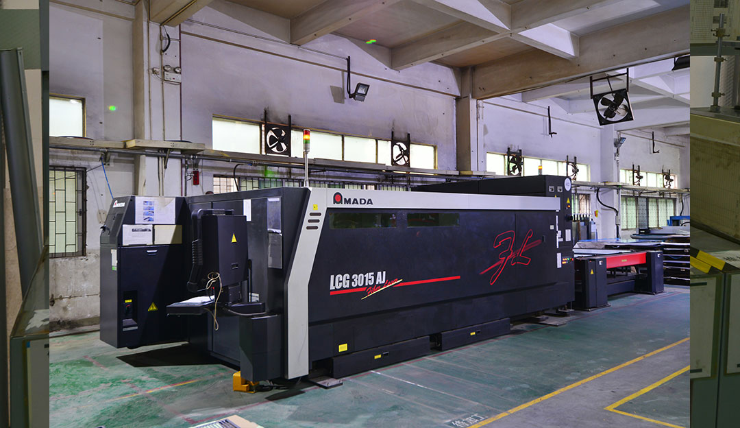 Large CNC or machining equipment on a factory floor.