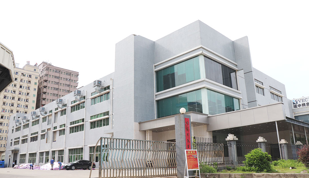 Exterior of a multi-story production or office building.