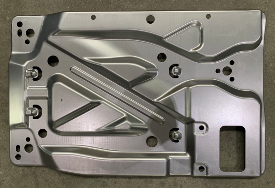 Formed metal panel example for Mexico production-fit discussions.